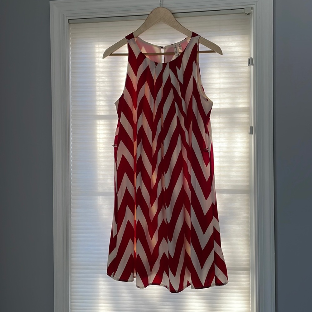 red and white chevron patterned dress.